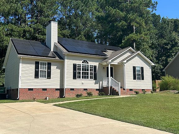 Front house. Large Driveway