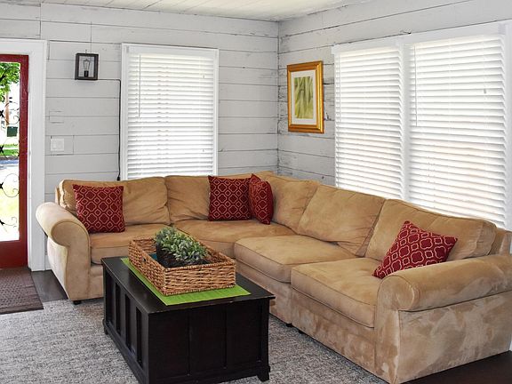 Nice and light ship lap lounge (shown with front door open and mosquito net door closed)