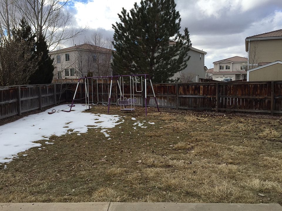 Large backyard with swingset