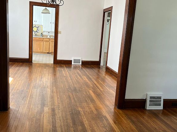 View from living room looking into dining room and kitchen. Nice open floor plan