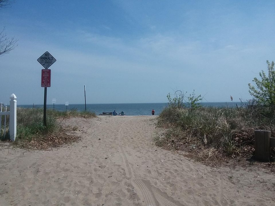 Just steps to this beautiful sandy beach