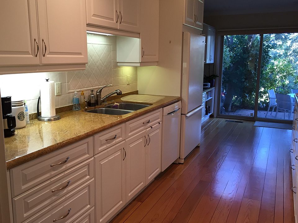 Remodeled kitchen with doors to patio