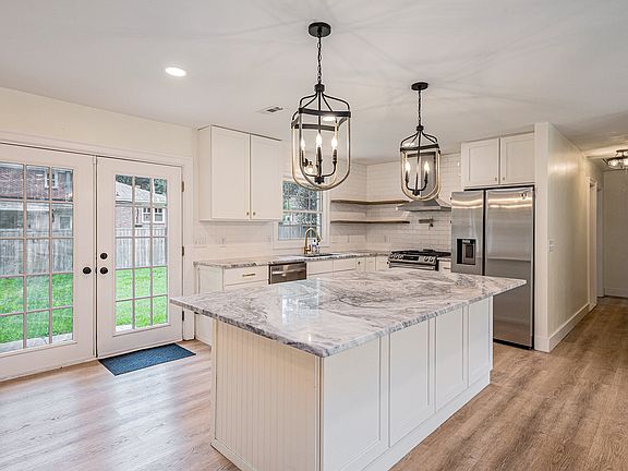 Kitchen with large island and all new appliances
