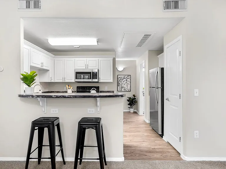 Savor breakfast bars that open up your kitchen to vibrant living spaces.