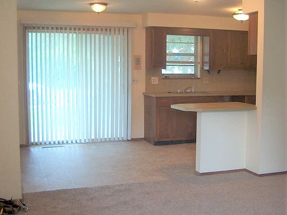 Living Room/Kitchen - NEW Carpet & Vinyl