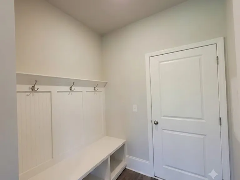 Mudroom Cubbies with Coat Racks. This is entrance from two car garage
