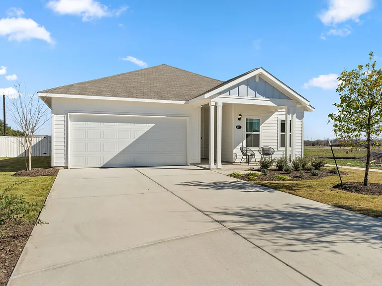 Two car garage and driveway for off-street parking