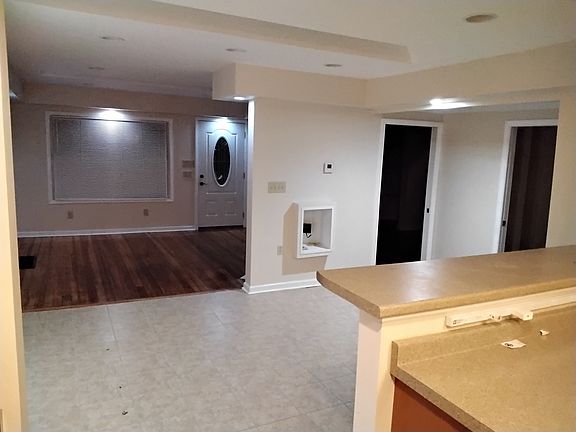 View from Kitchen into Dining room/Living room area