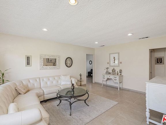 5th image of 9732 E Camino Real Ave