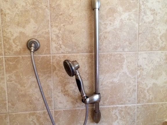 handheld shower and handrail