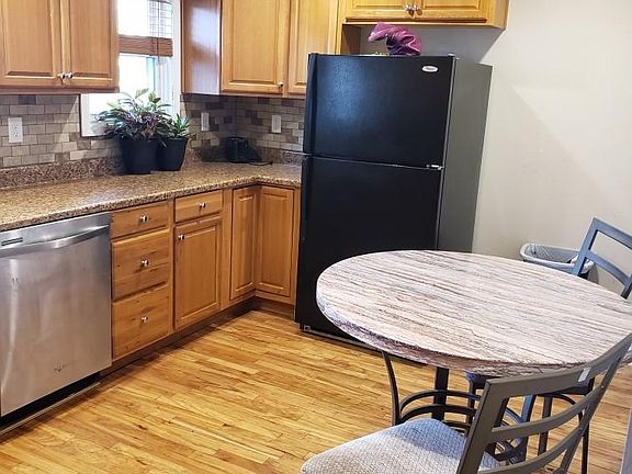 Original hardwood floors in the kitchen.