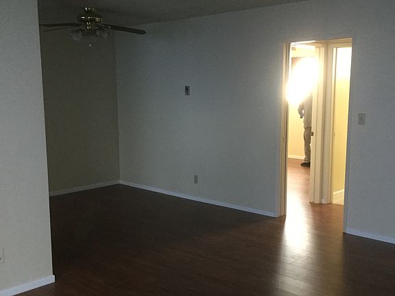 Dining area off living room. Beautiful wood floors