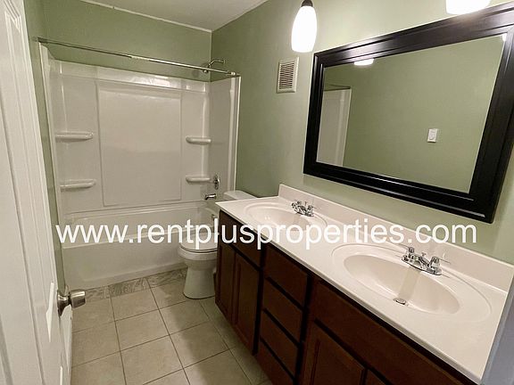 Upstairs Main Bathroom with double sinks