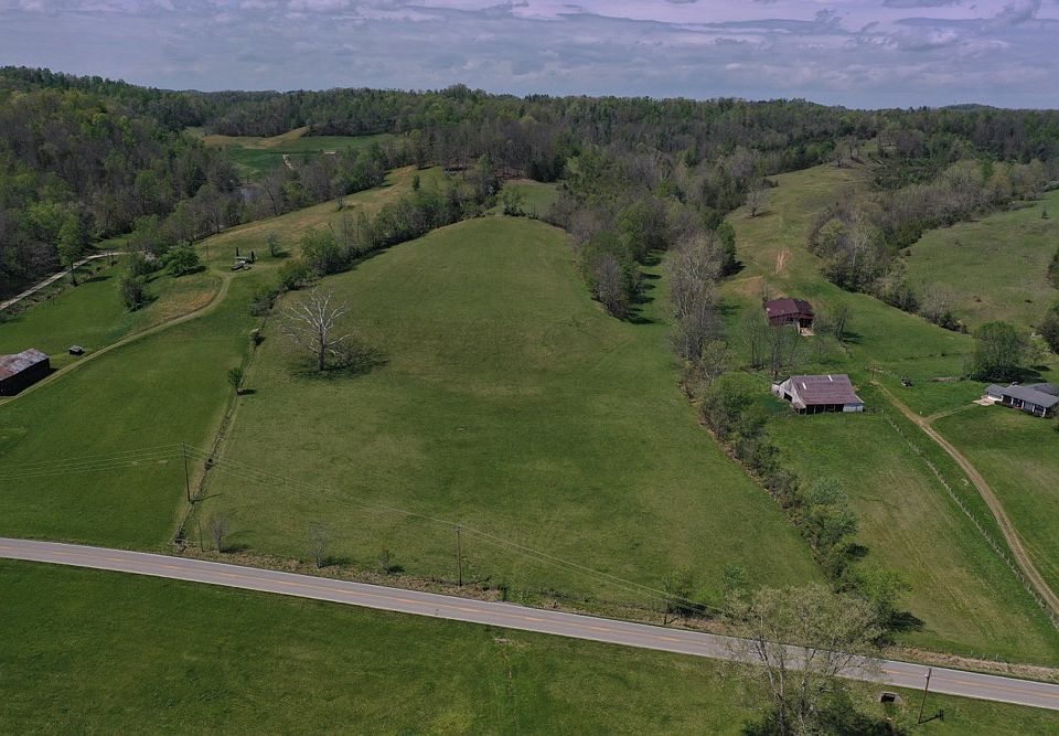 Stunning aerial perspective capturing the full character of the property. A gently rolling pasture, scenic surroundings, and excellent accessibility