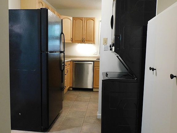 Full sized refrigerator.