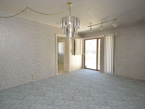 Formal dining room with sliders to patio