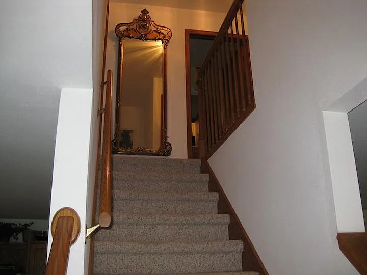 Stairs to 2nd floor/upper central hallway