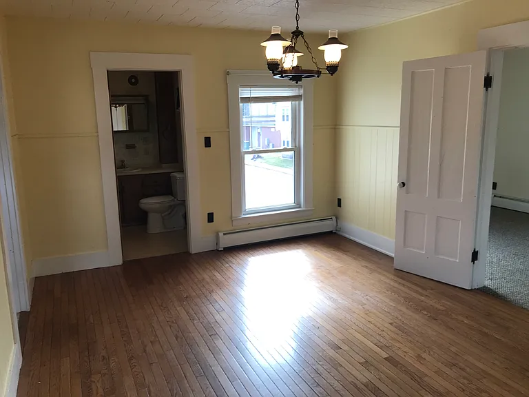 Living room, standing at master bedroom door.