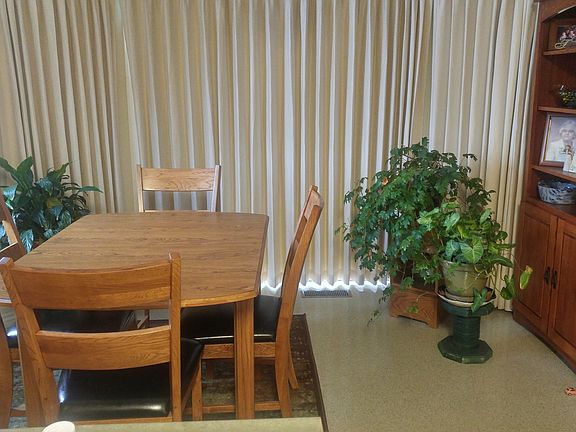 In kitchen dinning area. 