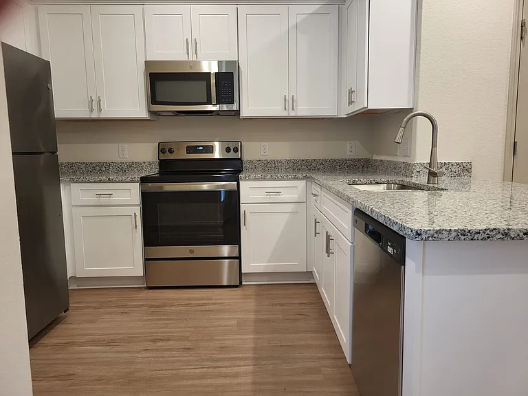 7636 Magnolia Vlg #101 — Photo 8