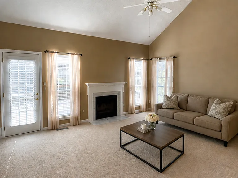 Living room looking towards back yard (deck is right outside door)