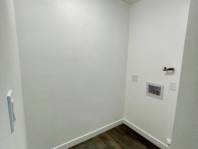 Washer & Dryer hookups located in first level / rear unit