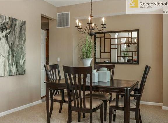 The dining room adjoins the kitchen.
