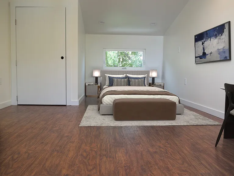 Or, use the window space for the bed, and have a large open room for exercise, project work or any other use.