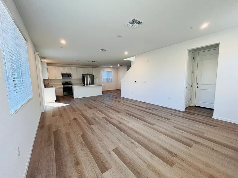 Great room, garage access door, coats closet