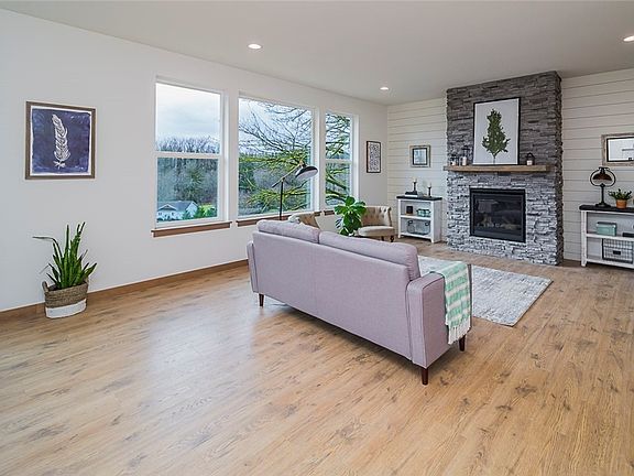 Photo of fireplace wall in previously built home.