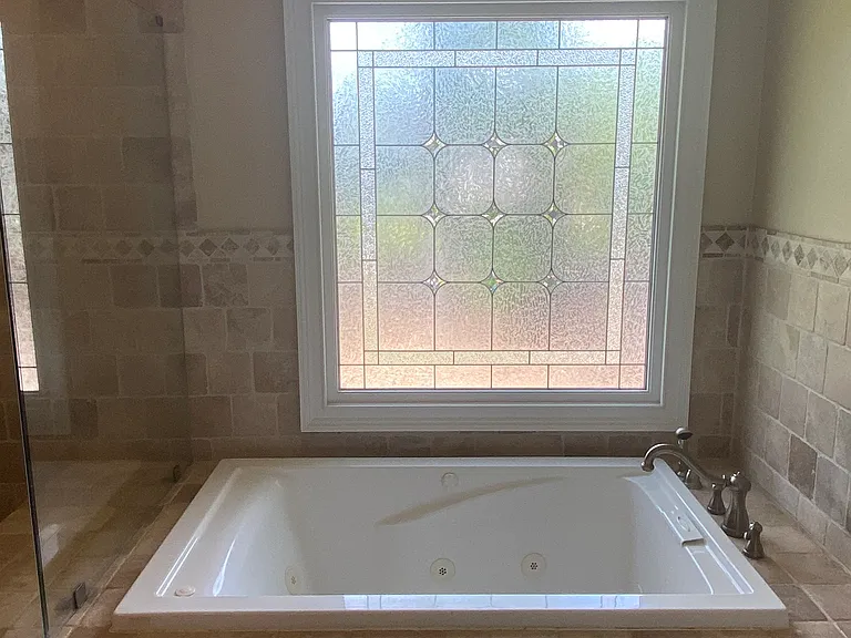 A spacious, oversized jacuzzi.