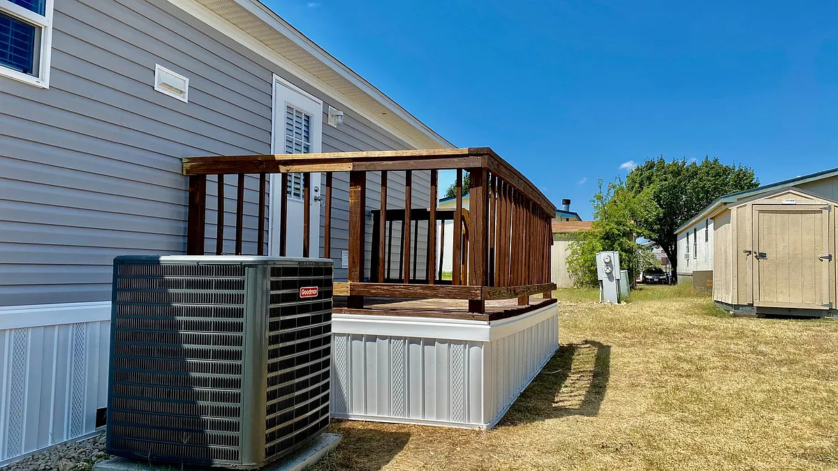 Back porch with large 4 ton ac and a shed. - 11045 Fumar Ln