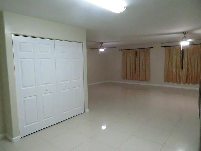 Washer and dryer, looking into living room.