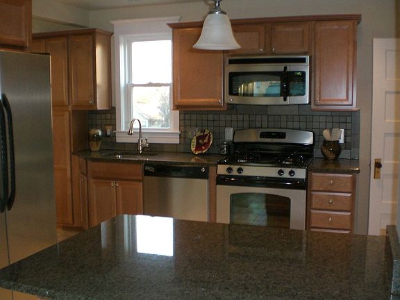 Gourmet kitchen with granite countertops