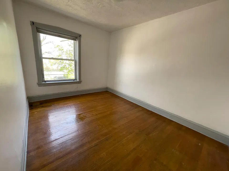 The bedroom is 13' x 10' plus a closet. A king size does fit