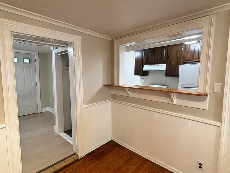 Living room with pass-through into kitchen