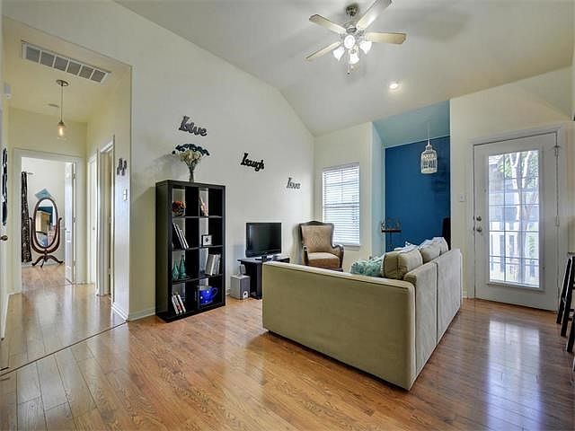 Gleaming laminate floors throughout the home.