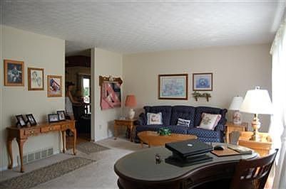 Front door opens to an inviting living room, with oversized entry closet
