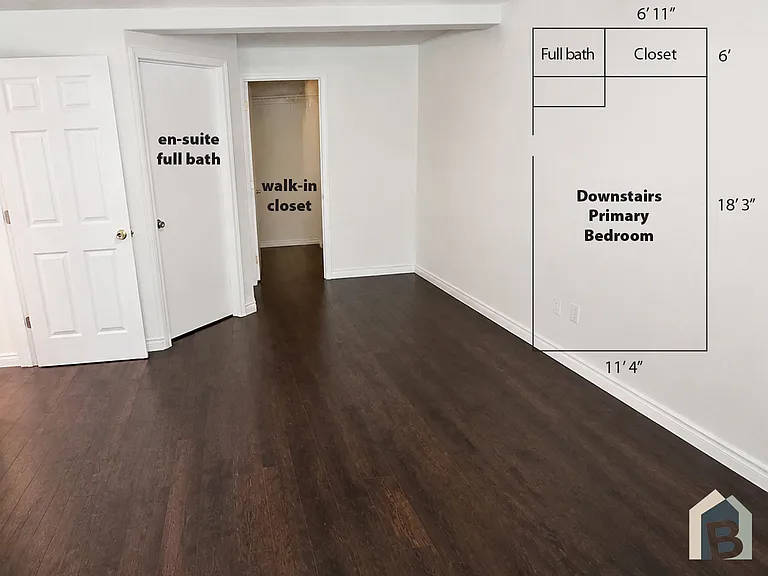 1st floor primary en-suite with large walk-in closet and view of lawn and mature evergreen trees
