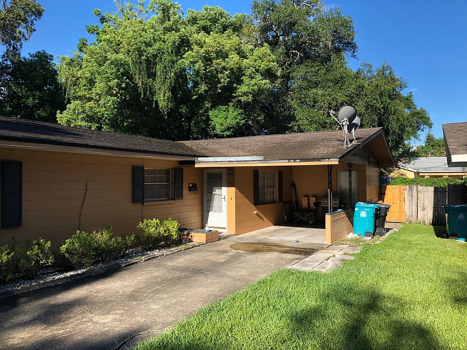 830 N Hyer is the back unit with one carport. You can also see the bright yellow gate to the fenced back yard.