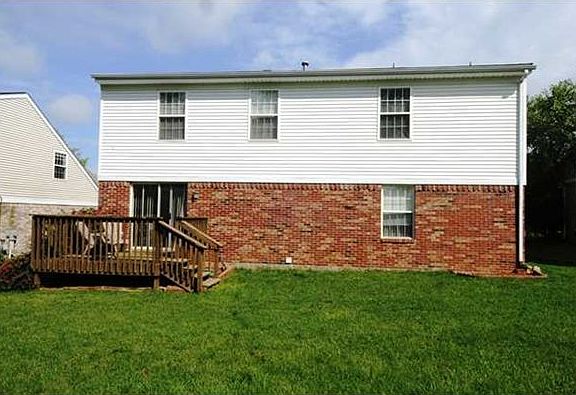 Large flat backyard with deck