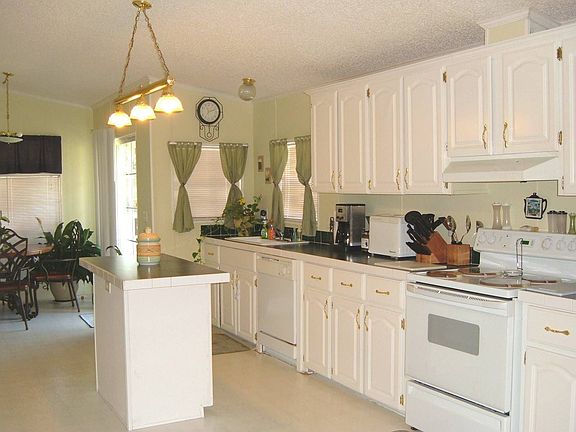 Loads of Cabinets in this Large Kitchen