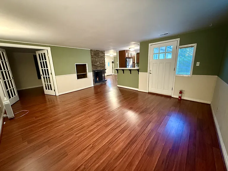 Large living room off kitchen with breakfast bar