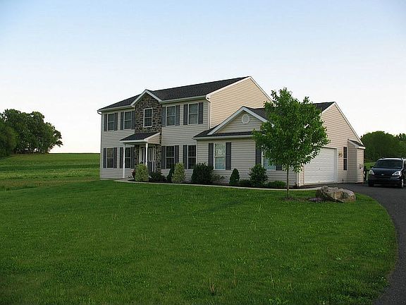 Front of house as seen from halfway up the driveway