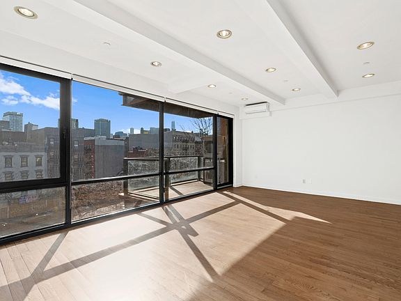 2nd image of 229 E 2nd St APT 5A
