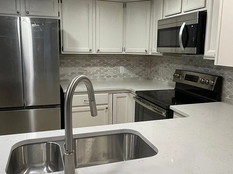 New refrigerator, new sink and faucet. Recessed LED lighting for a bright kitchen, but dimmable for ambience
