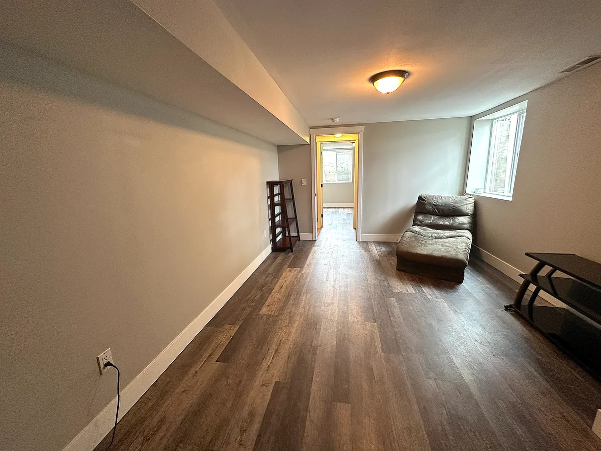 Another view of room. Second bedroom seen thru door. - 25th Ave E