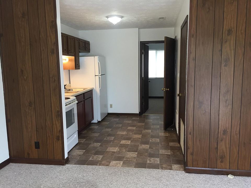 View from living room to kitchen, bath, bedroom.
