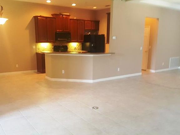 5th image of 801 Champion Woods Ct