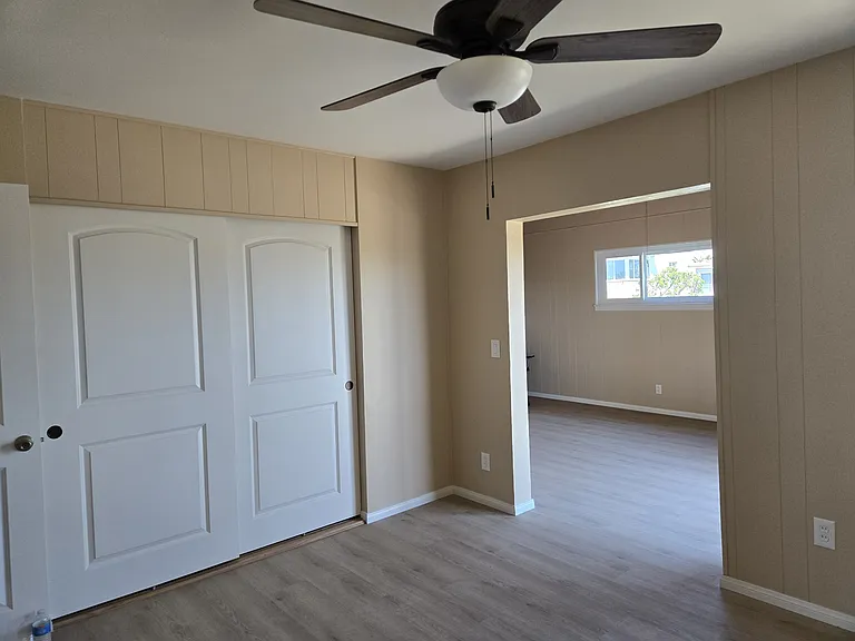 Large bedroom with attached office space